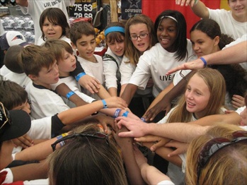 Group of Children with their hands all in